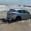 Mazda CX-5 nearly swept out to sea at Johor beach, dragged to safety by cops and local resident’s 4×4