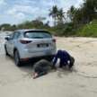 Mazda CX-5 nearly swept out to sea at Johor beach, dragged to safety by cops and local resident’s 4×4