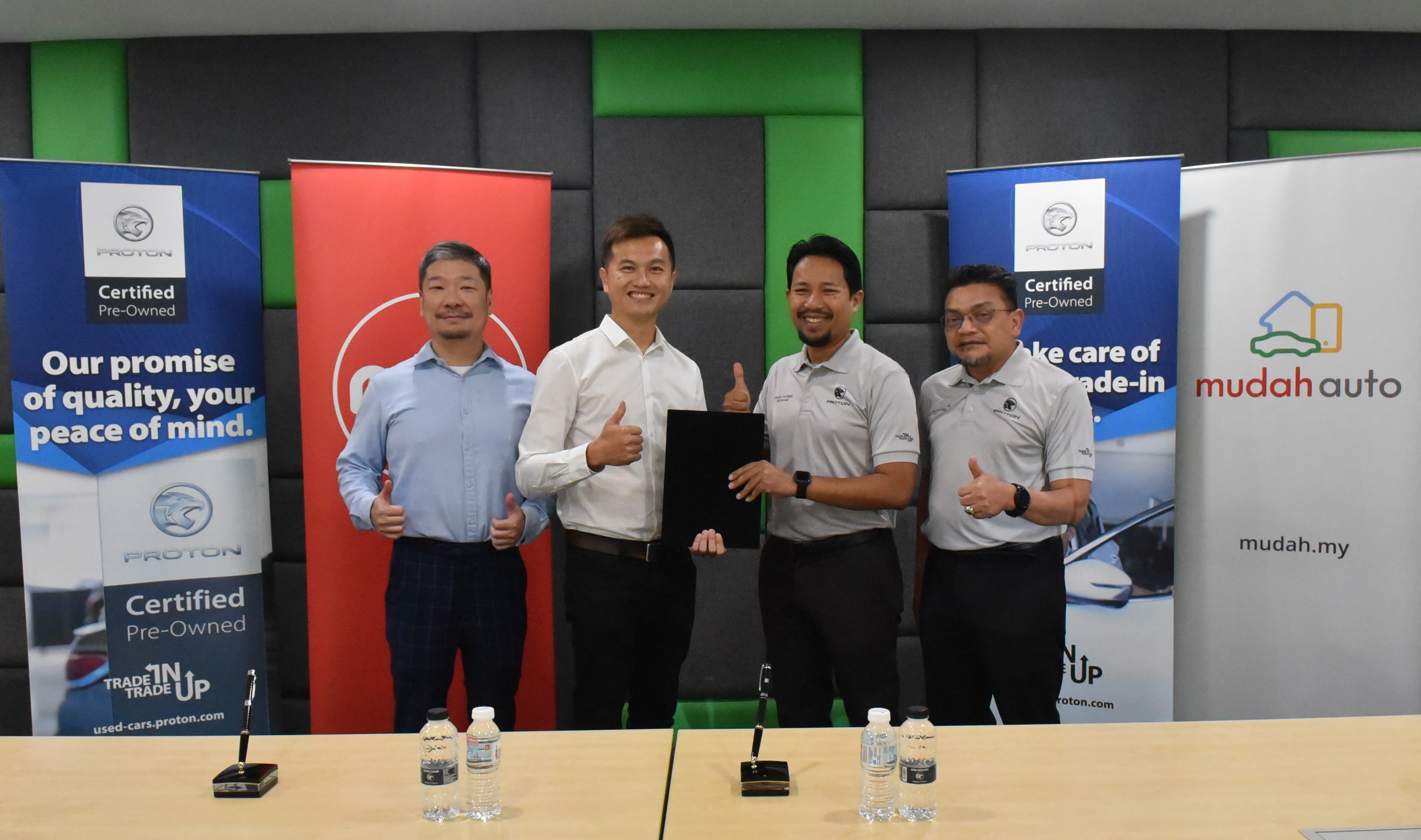 Signing cooperation cooperation for e-procurement Proton_MUV