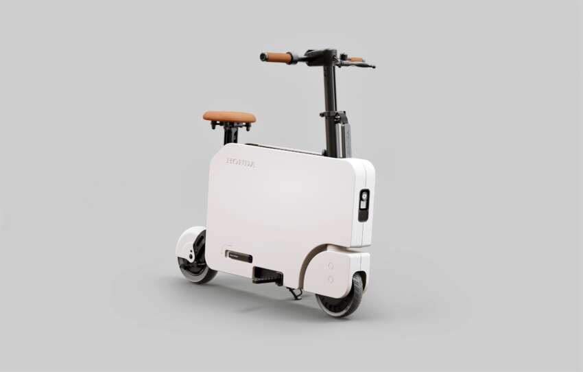 Honda Motocompacto – foldable electric scooter with 20 km range, 24 km/h Vmax, 18.7 kg; RM4,667 in US 1672385