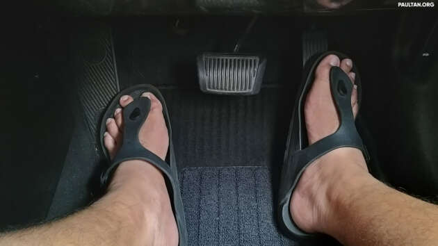 Can you drive a car in Malaysia wearing slippers?