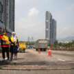 Works Minister inspects danger spot on Kg Pandan flyover, temp repair on joint that caused riders to fall