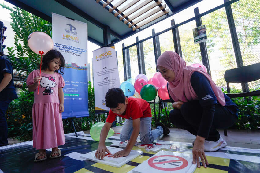 Prolintas MIROS safety awareness campaign at Elmina R&R on GCE encourages safe driving, child seat use 1738754