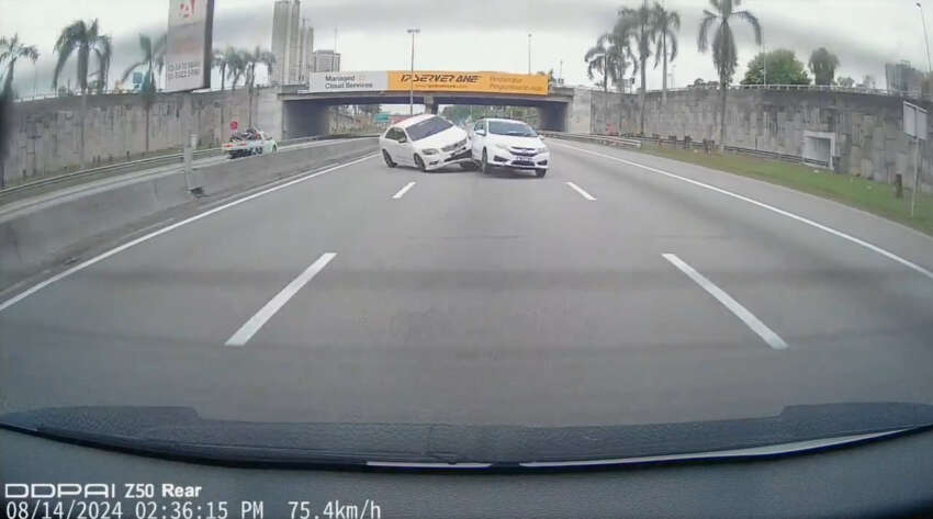 Toyota Camry overturns upon crashing into Honda City on Kesas Highway near Awan Besar, KL 1803248