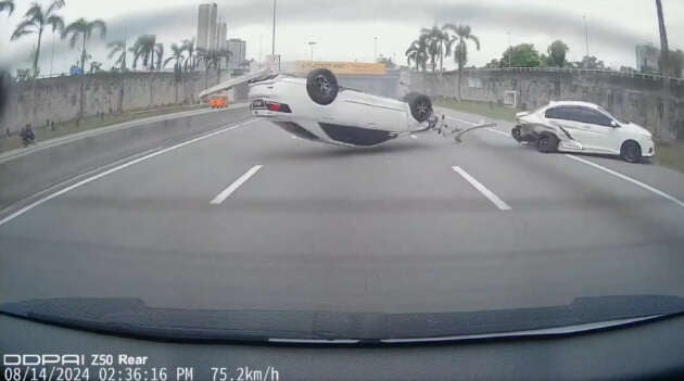 Toyota Camry overturns upon crashing into Honda City on Kesas Highway near Awan Besar, KL