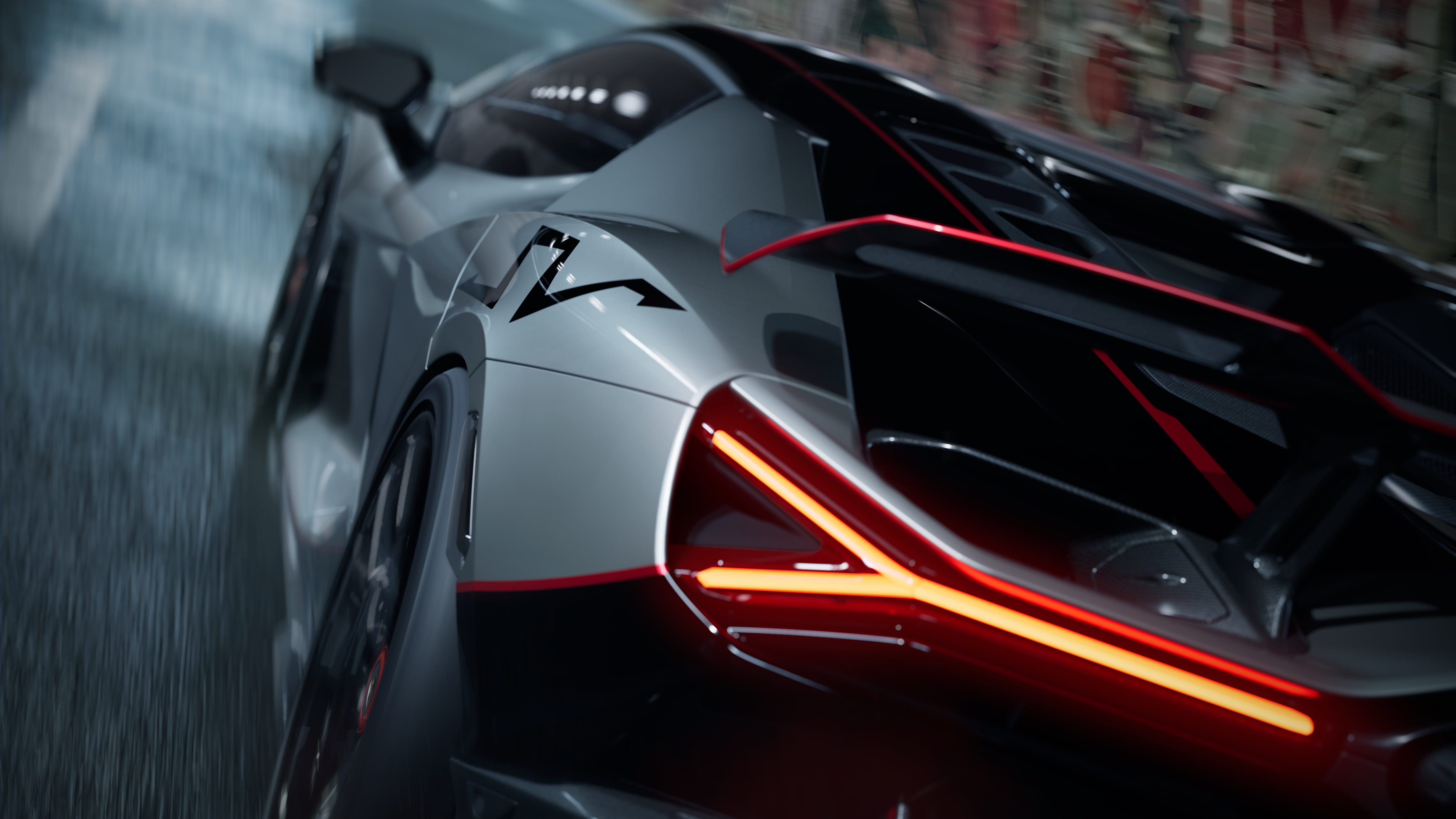 Задняя часть Lamborghini Revuelto SV в движении на трассе