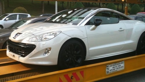 White Peugeot RCZ snapped on trailer in Putrajaya