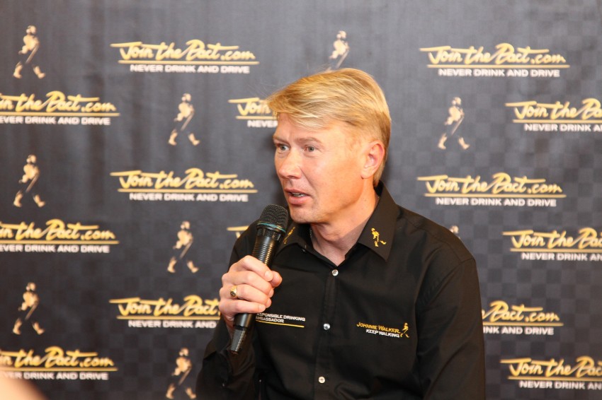 Power is nothing without control: Mika Hakkinen performs stunts at ‘Join the Pact’ event 123114