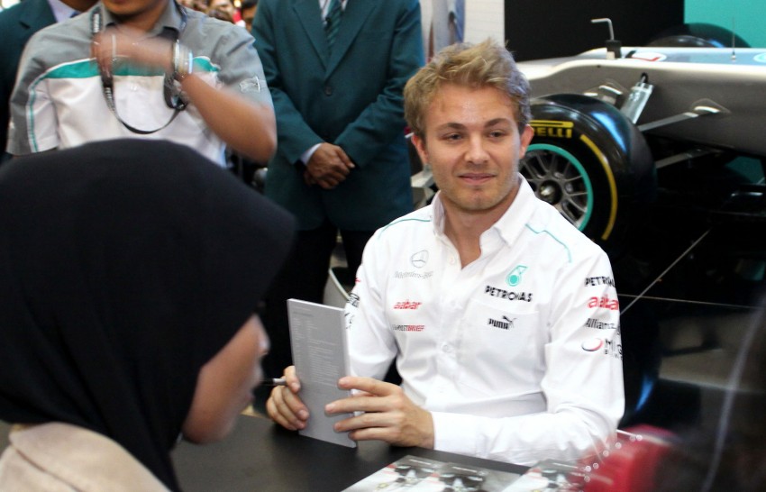 Michael Schumacher and Nico Rosberg meet & greet fans 95246
