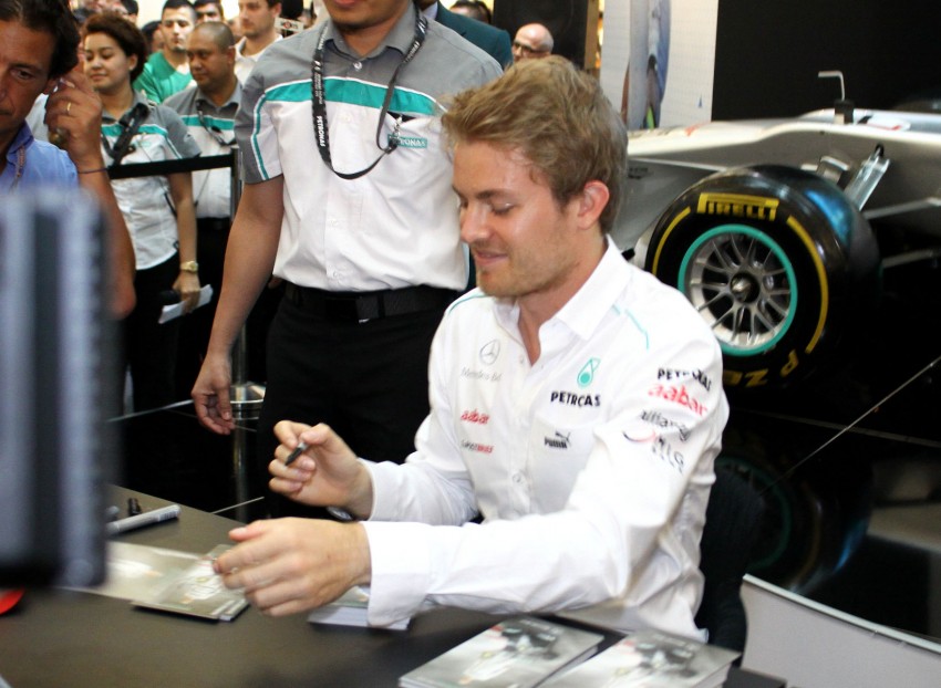 Michael Schumacher and Nico Rosberg meet & greet fans 95247