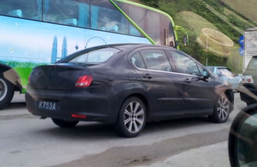 Peugeot 408 sighted again, still wearing tape
