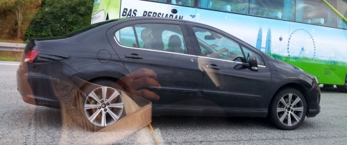 Peugeot 408 sighted again, still wearing tape