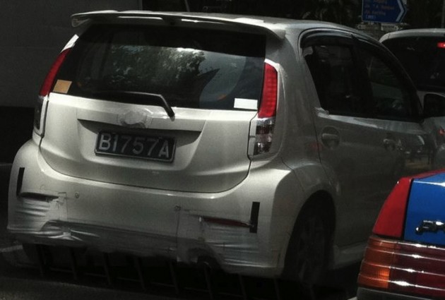 White Honda Brio sighted in Malaysia, with trade plates belonging to Perodua!
