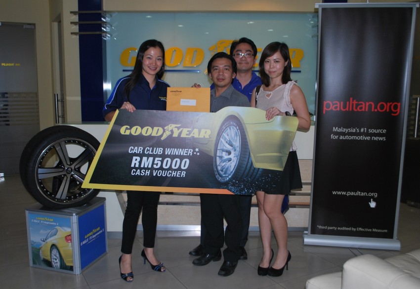 Lucky winners of the Goodyear Get The Grip contest drive home with their prizes! 144319